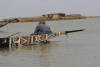 Fisherman Pulling Net